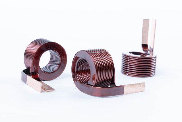 Wickelgüter, induktive Bauelemente, Hochkantwicklungen, Hochkantwickeln, neue Technologie, Spulen, Übertrager, Wickelgüter, Kupferdraht, Flachdrahtwicklung, Flachdrahtwickeln